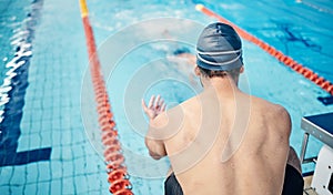 Start, back and man at swimming training for fitness, health and sports body for a competition. Workout, motivation and