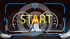 Start concept on a car dashboard with speedometer and warning lights.