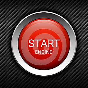 Start engine button on carbon background