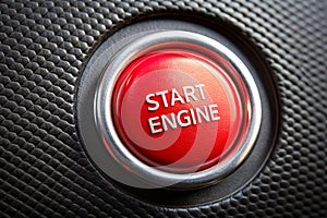 Start engine red blank button on black plastic background