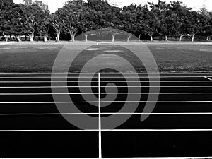Start and Finish point of a race track in a stadium(Black and white photo)