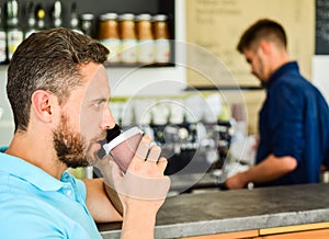 Start great day. Man speak mobile phone and drink coffee cafe bar background. Traditional beginning of his day. Man