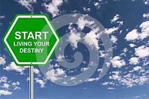 Start livihg your destiny traffic sign on blue sky