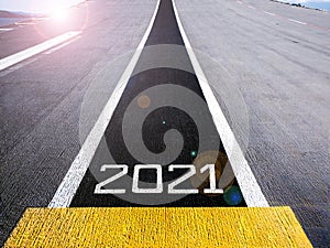 Start and look ahead to the future in new year two thousand twenty one 2021, painted on a runway of an aircraft carrier with