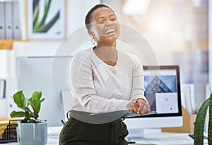 Start moving in the direction of the life of your dreams. a beautiful young businesswoman standing in a modern office.