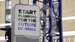 Start Planning For The Future of Work sign in a city setting under construction