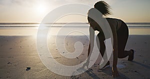 Start, running and woman on the beach at sunset with exercise, workout or training for a race. Cardio, fitness and