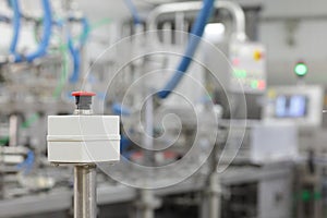 Start - stop button on industrial device in plant