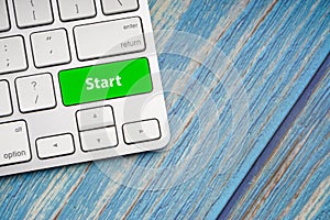 START text on button of computer keyboard.