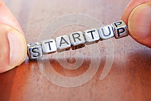 Start up business finance concept with metal letters