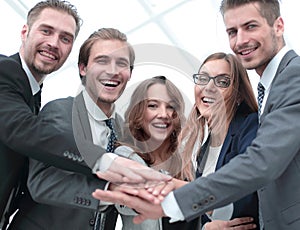 Start up business people teamwork cooperation hands together