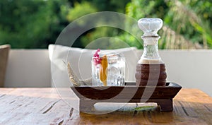 Start Up, mocktail drinks add the mixture with raspberry, jasmine and thaitea. A glass of ice, orange peel and wildflowers place