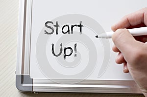 Start up written on whiteboard