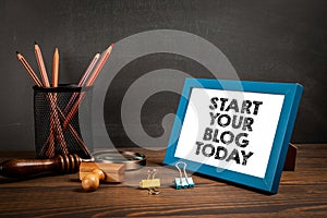 Start your blog today. Motivational text in the picture frame