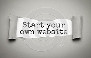 Start Your Own Website on white torn paper