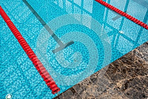 Starting blocks and lanes in public swimming pool