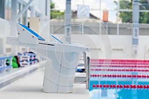 Starting blocks and lanes in a swimming pool