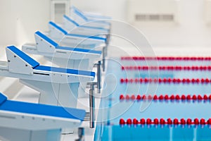 Starting blocks and lanes in a swimming pool