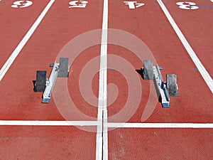 The starting blocks on the running track