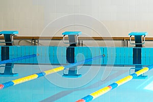 Starting blocks in a swimming pool