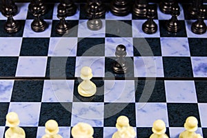 Starting game of chess on chessboard. Game concept