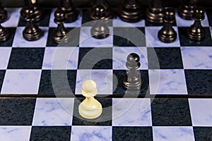 Starting game of chess on chessboard. Game concept