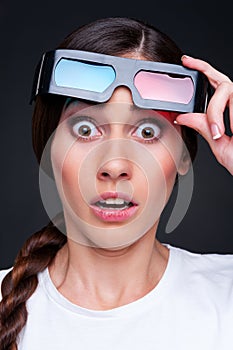 Startled woman in 3d glasses