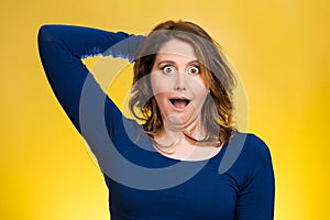 Startled woman, looking shocked, surprised photo