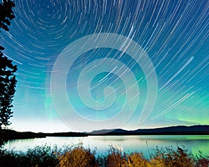 Startrails Aurora borealis display Lake Laberge