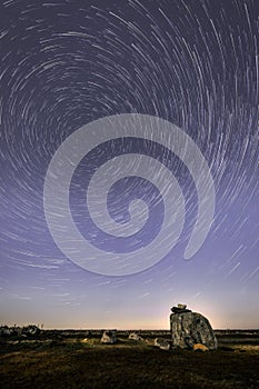 Startrails in the sky illustrates the passage of time