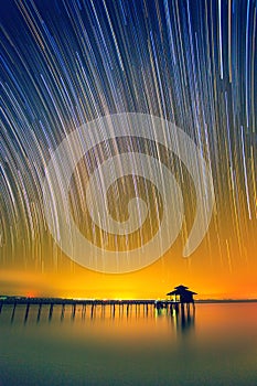 Startrails: Wooden Cabin and Bridge