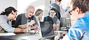 Startup business and entrepreneurship problem solving. Young AI programmers and IT software developers team