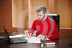 Startup business, software developer working on computer at modern office.