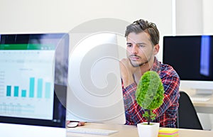 Startup business, software developer working on computer at modern office