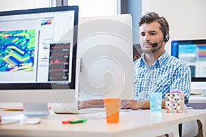 Startup business, software developer working on desktop computer