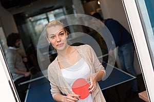 Startup business team playing ping pong tennis