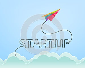 Startup concept with colorful paper plane rising through the sky