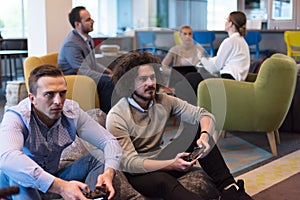 Startup Office Workers Playing computer games