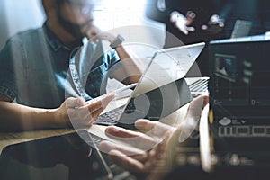 StartUp Programming Team. Website designer working digital table