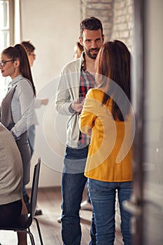 Startup team relaxing from work during coffee break