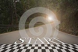 Startup to success business printed on road leading towards