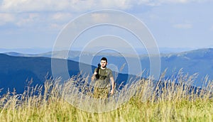 State border guard service. Man with weapon military clothes in field nature background. Army forces. Protecting borders