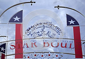 State Fair Texas sign and flags