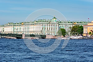State Hermitage museum WInter palace and Palace bridge over Neva river, Saint Petersburg, Russia