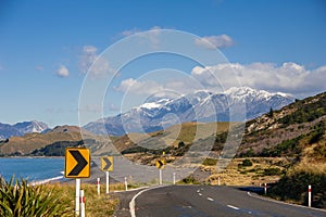 State Highway 1, Kaikoura, New Zealand. Beautiful winter scene, deserted coast road in alpine landscape