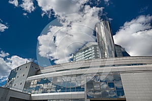 State Institution `National Library Of Belarus`, Futuristic Back View With Reflections Of Blue Sky And White Clouds. One Of The M photo