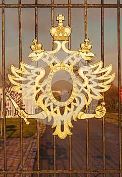 State Russian double-headed eagle on the fence of the park Tsaritsino