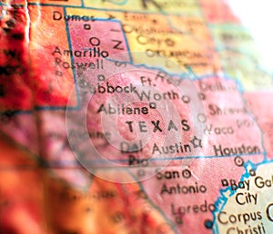 State of Texas USA focus macro shot on globe map for travel blogs, social media, web banners and backgrounds.