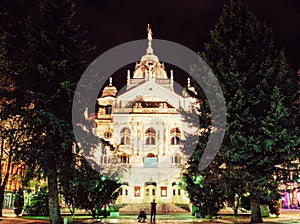 State theater in Kosice, Slovakia, night photo, yellow filter