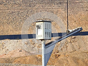 A static cutting edge traffic radar, speed trap camera ready to flash vehicles that exceeds the speed limit